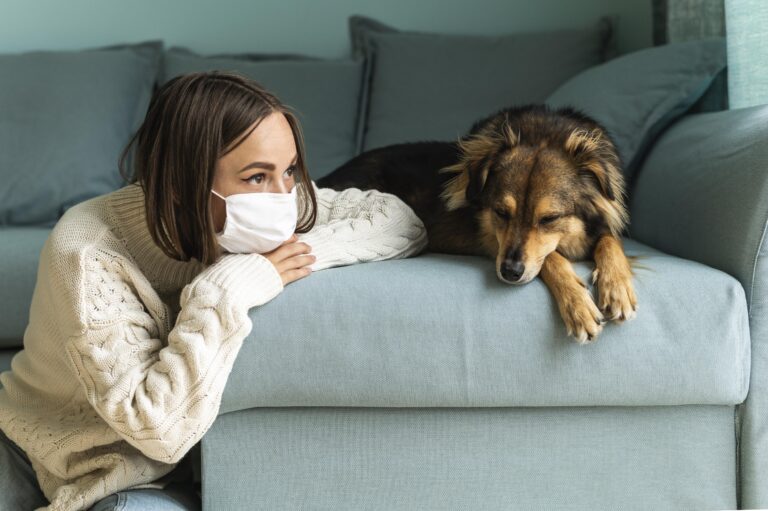 woman sitting her dog home pandemic